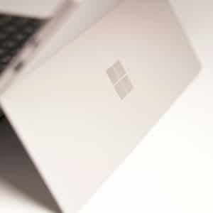 white-laptop-computer-on-white-table