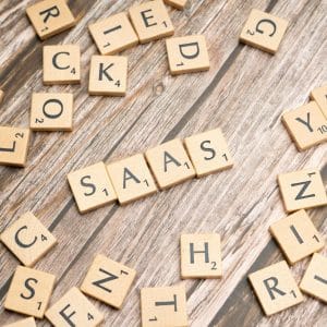 scrabble-letters-spelling-saas-on-a-wooden-tabl